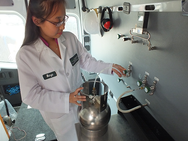 Scientist in van