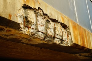 Corrosion damage on a concrete bridge on a busy throughfare in Frankfurt, aged about 50 years.