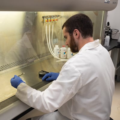 Scientist at hood