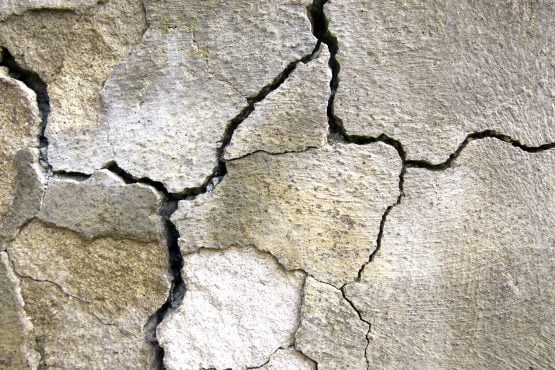 bigstock_Cracked_Concrete_3017896-555x370